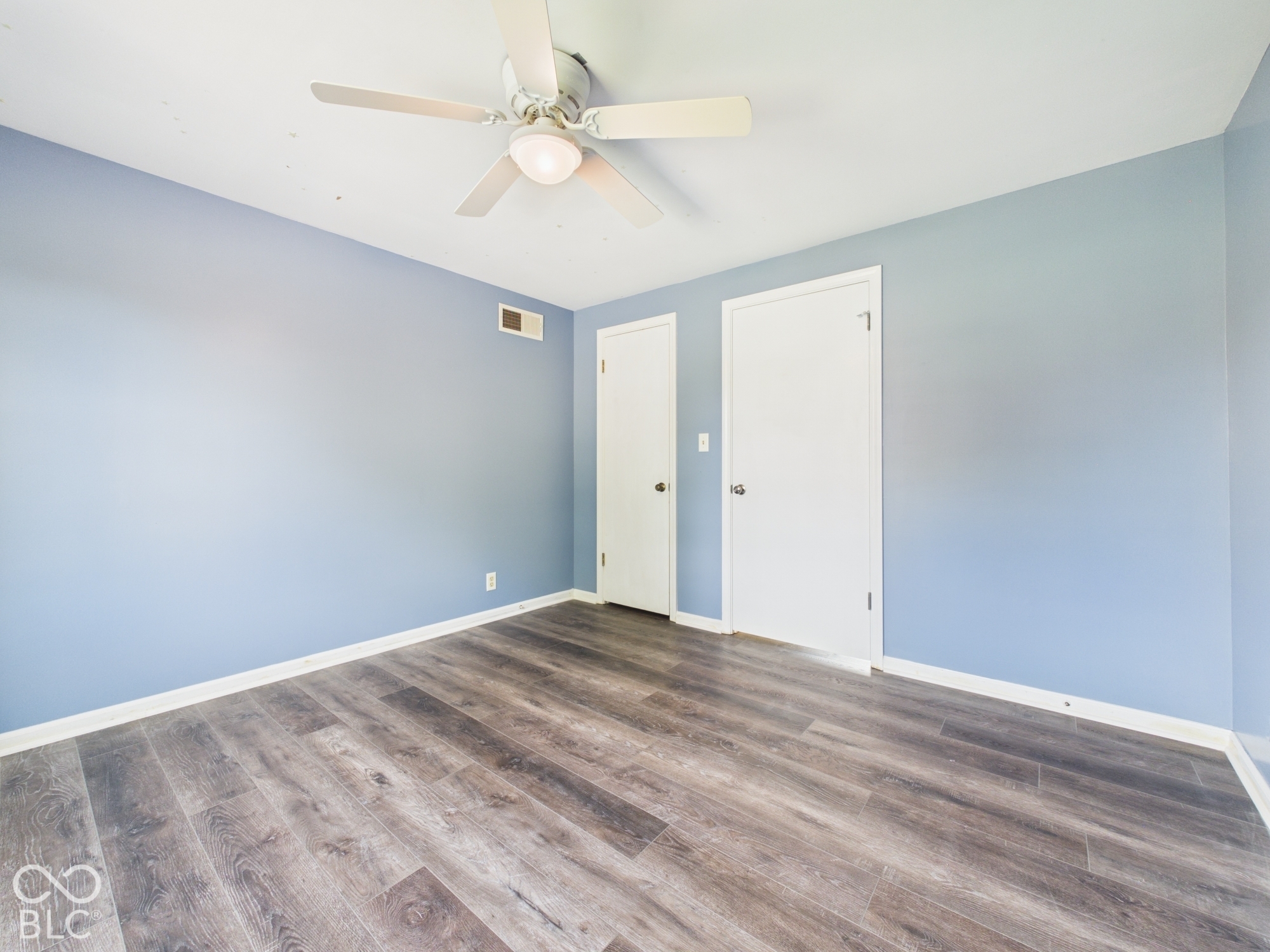 Wood-finish flooring with white trim