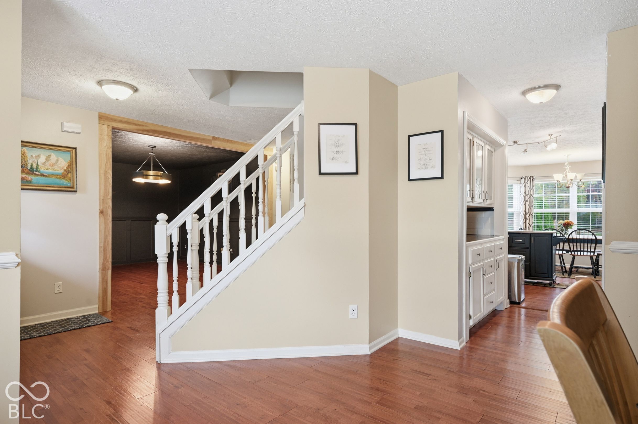 Taken From The Dining Room Looking Into Kitchen & Living Room