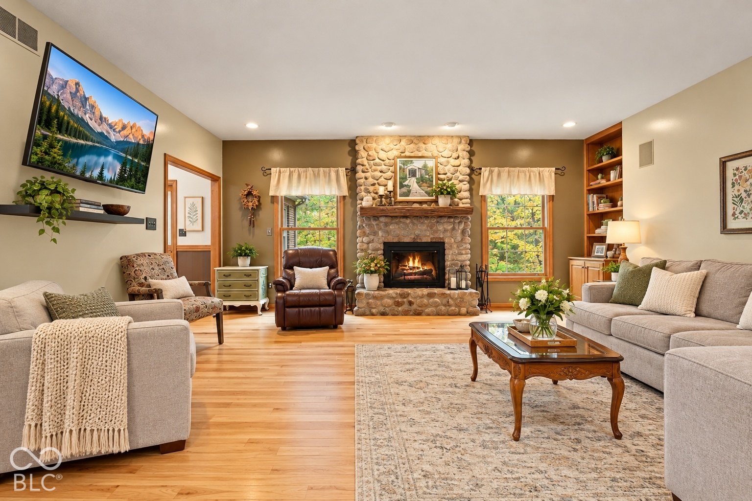Virtually Altered - Inviting Great Room with wood burning fireplace is the heart of the home