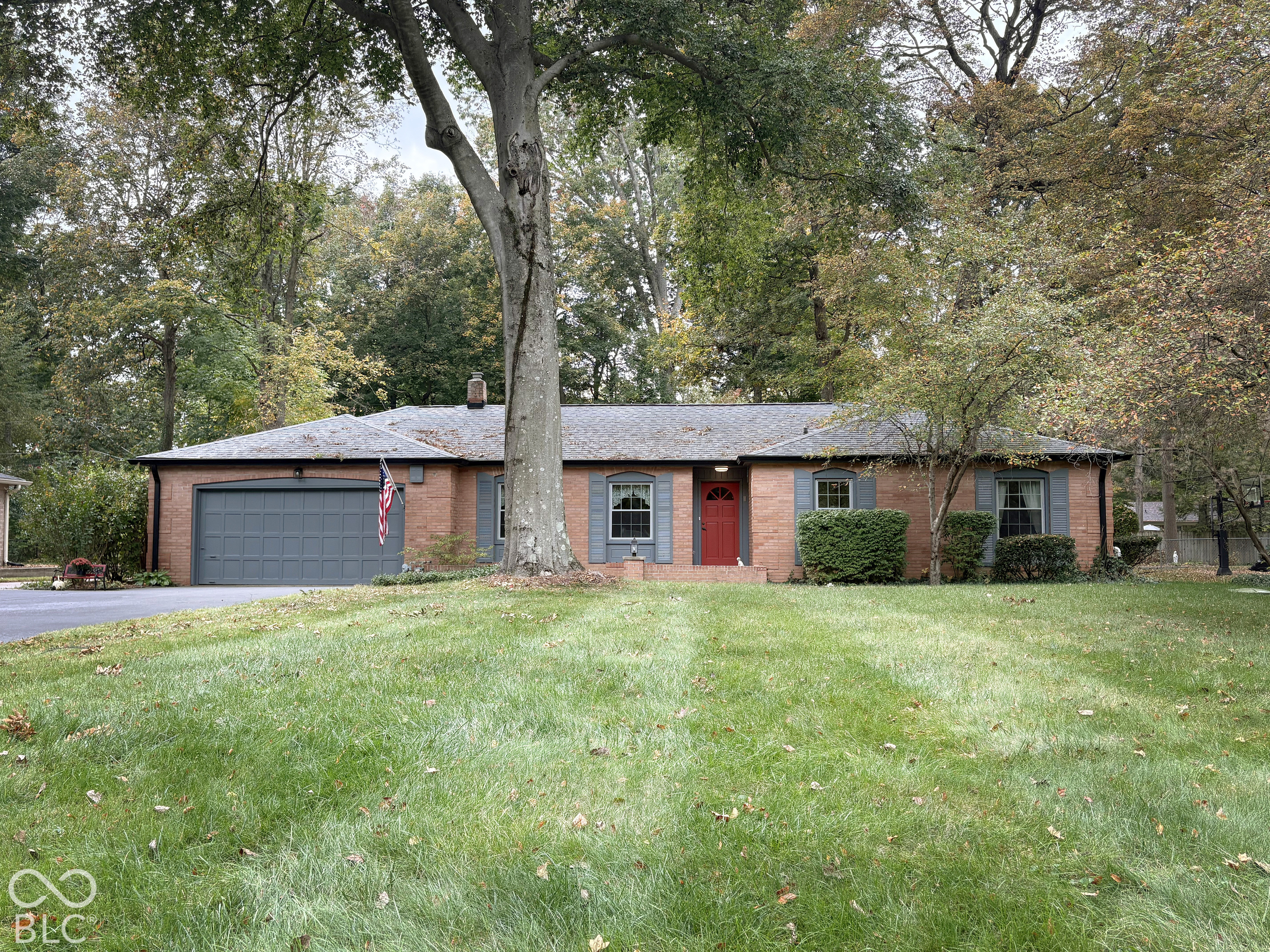 All brick 1960 ranch on gorgeous .38-acre lot with mature trees.