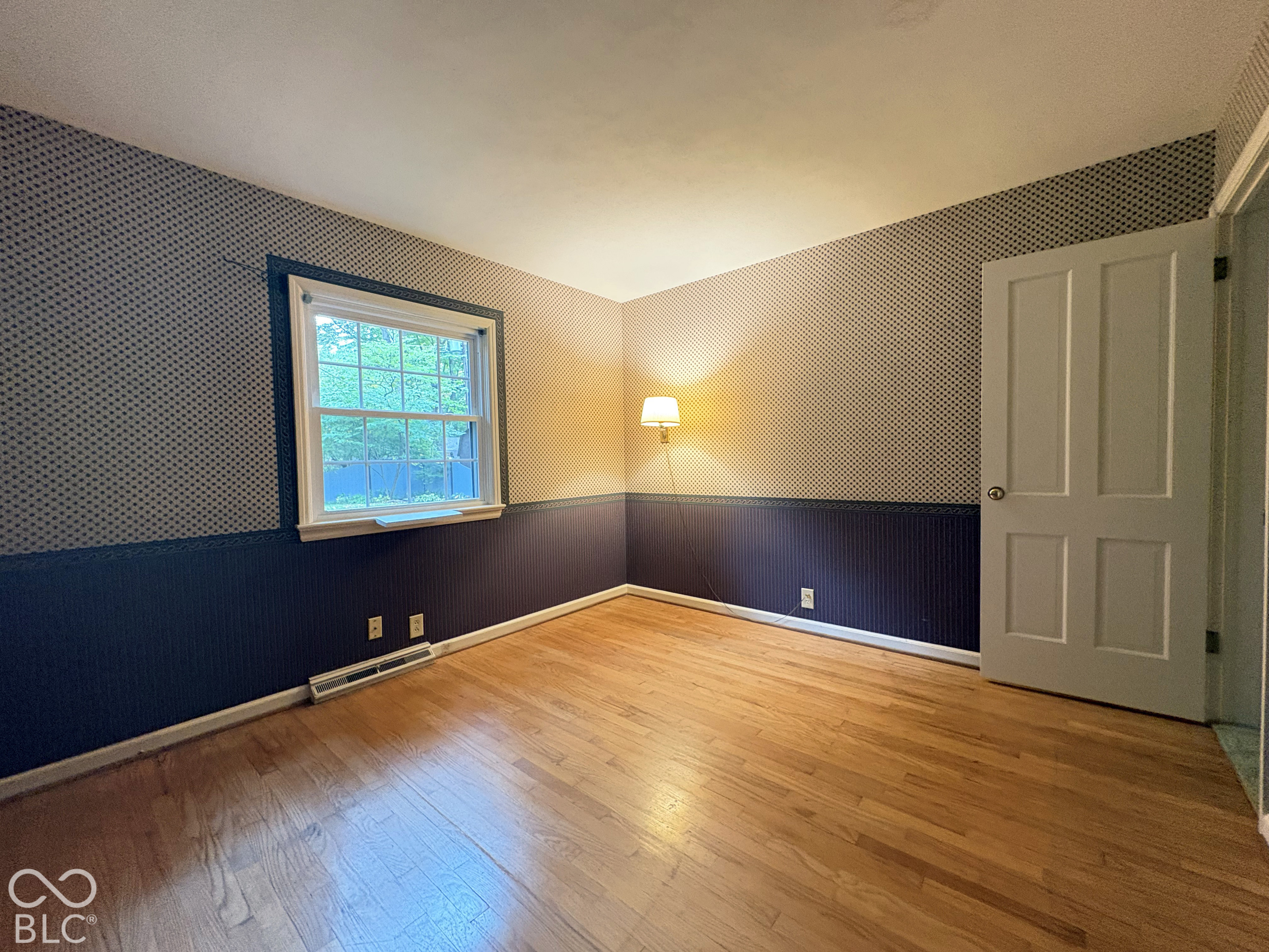3rd bedroom with hardwood floors.