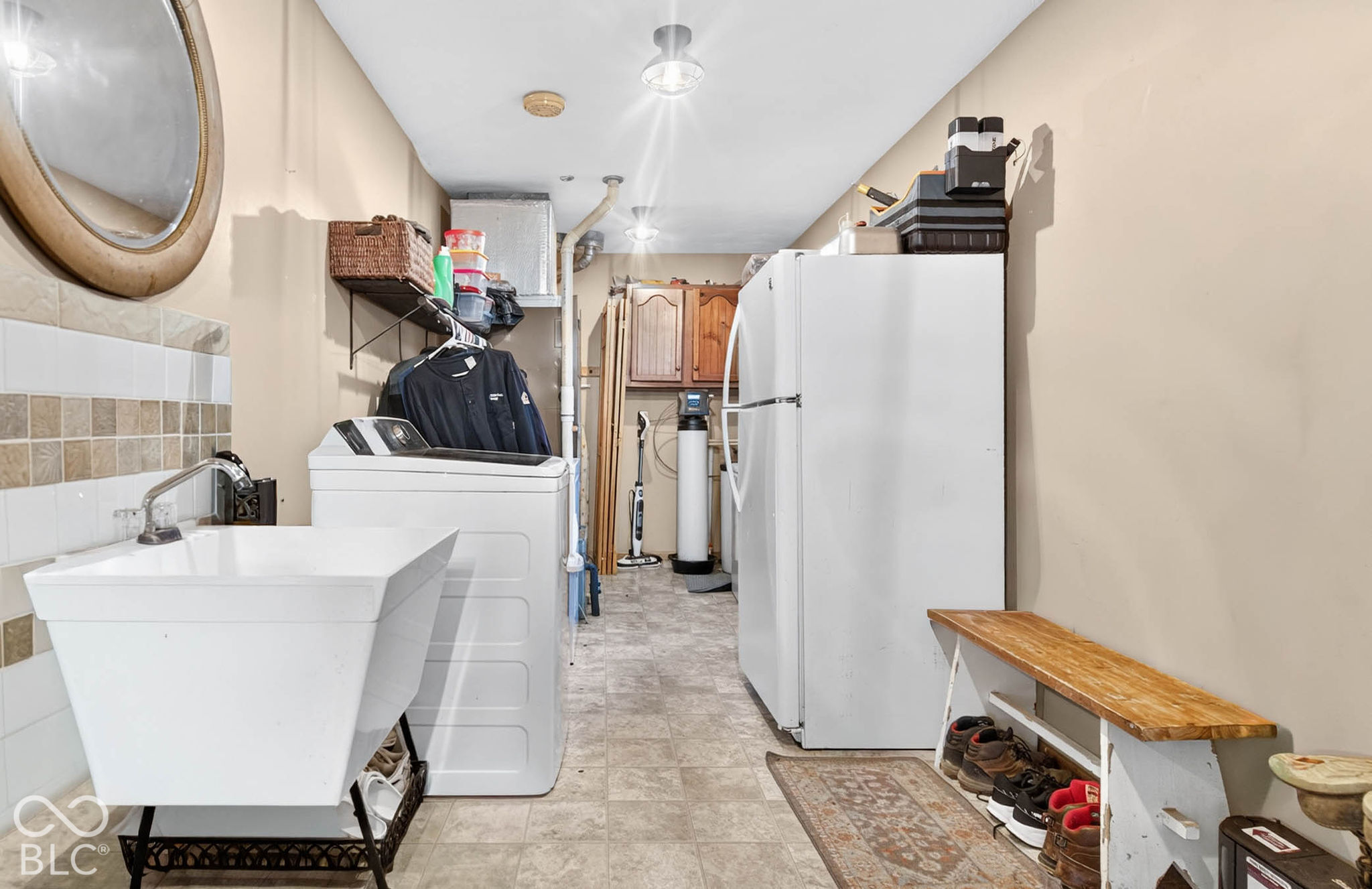 Large Mud Room & Laundry just inside back door.