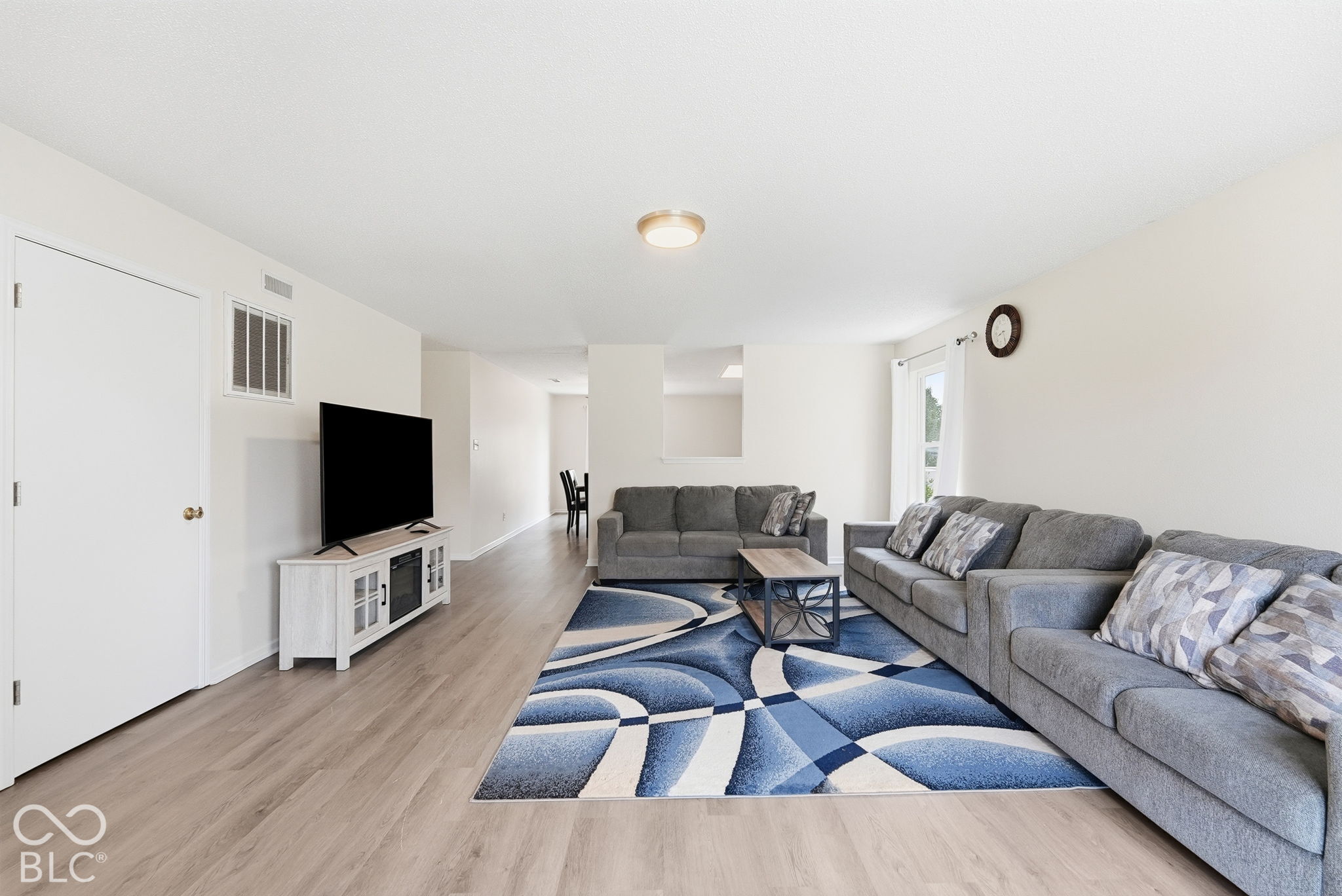 Wood-finish flooring and neutral wall paint Wood-finish flooring and neutral wall paint