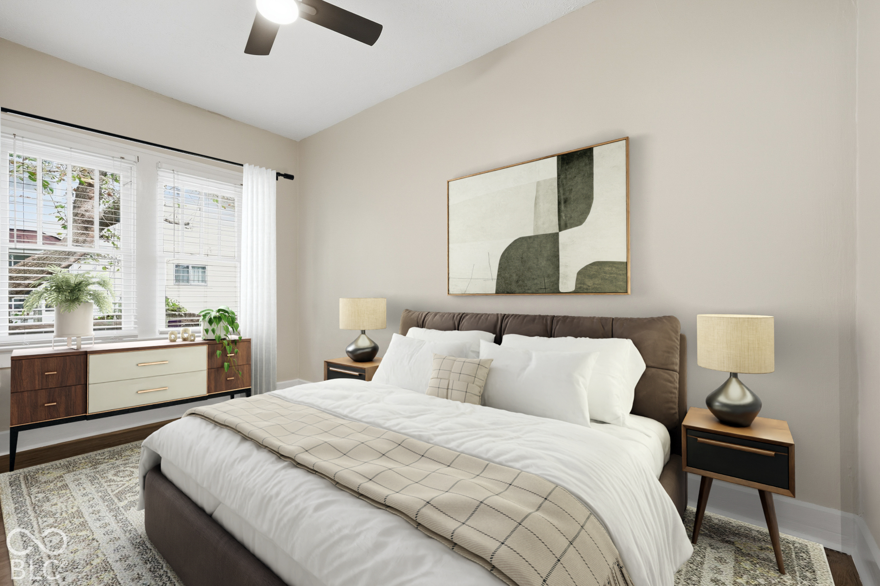 Room featuring neutral wall paint, multi-pane windows, and a ceiling fan with integrated lighting