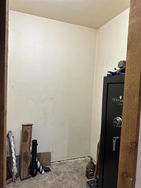 Miscellaneous room featuring concrete flooring