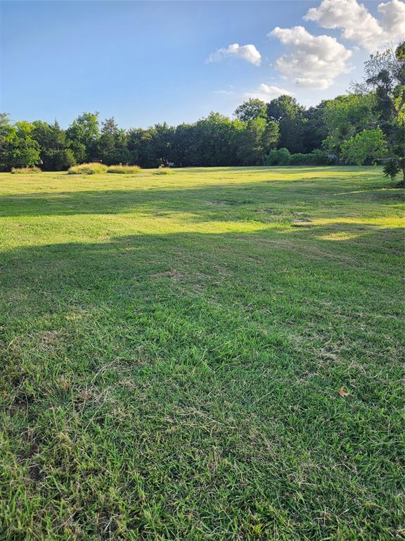 View of grassy yard with a view of countryside View of grassy yard with a view of countryside