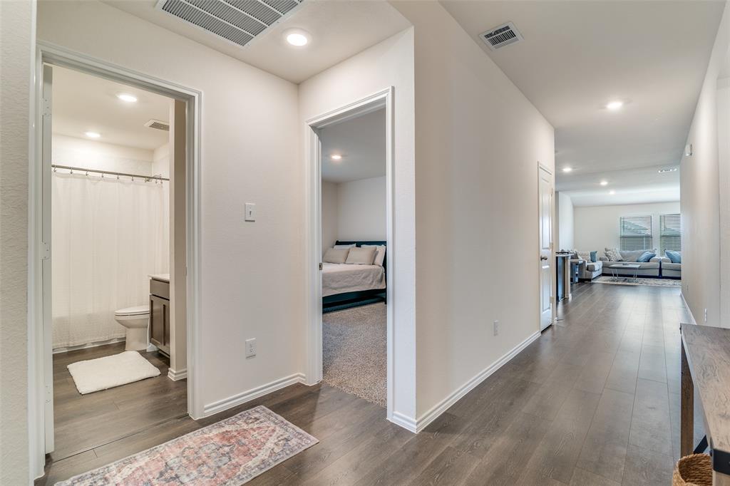 Entry from front door.  2 bedrooms on left, living ahead.