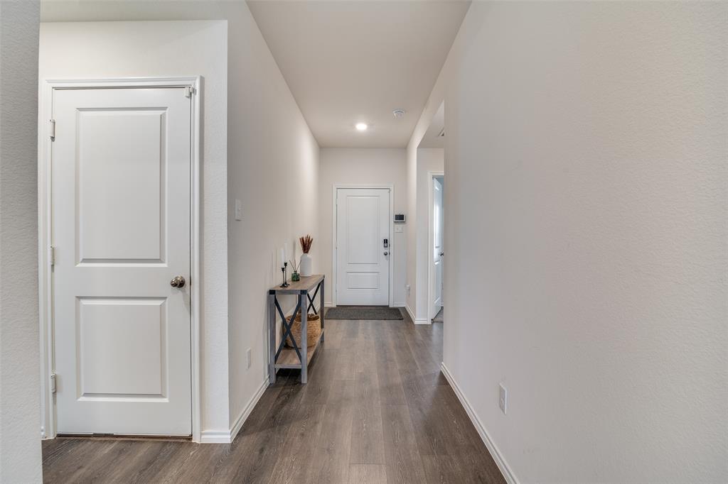 Looking back at entry from kitchen.