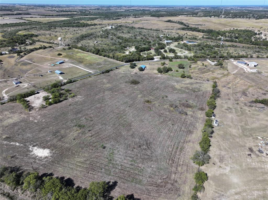 Aerial view of property's location with rural landscape