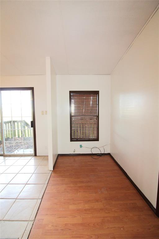 Empty room featuring wood finished floors Empty room featuring wood finished floors