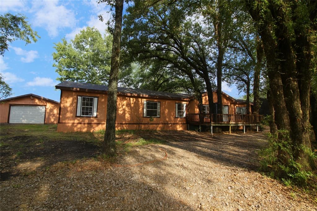 View of home's exterior with a deck