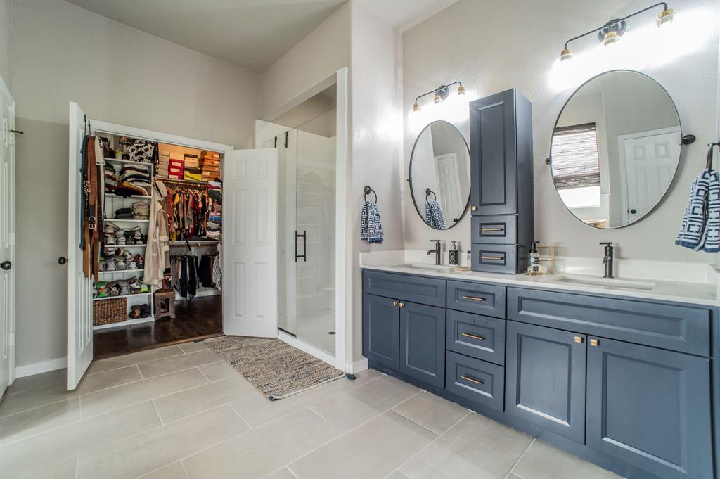 Primary suite bath suite. Spacious and bright. Large walk-in closets.