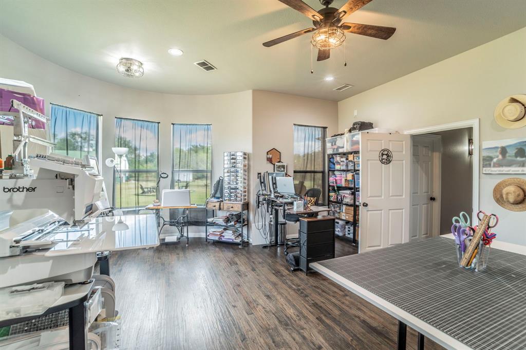 Bonus living area. Currently a craft room. Large circular sitting area.