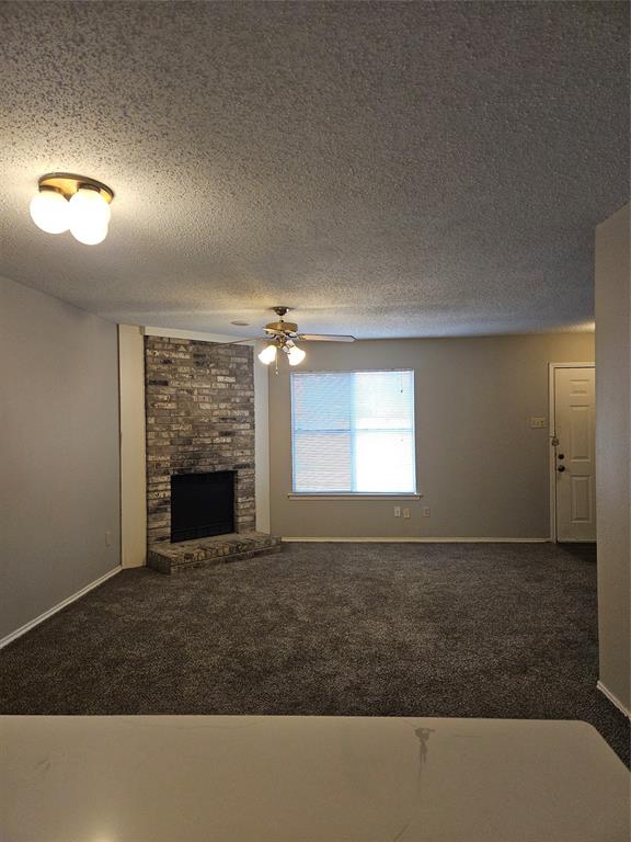 810 - From the kitchen, the view of dining, living, hearth, and front door.