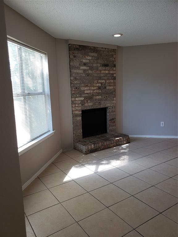 808 - Front window and hearth from entry. (For rentals, the fireplace is covered; simple to uncover.) 808 - Front window and hearth from entry. (For rentals, the fireplace is covered; simple to uncover.)