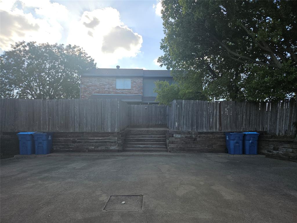 808-810 Red Bud - back alley parking and garbage pickup. 808 is on the left, 810 is on the right.