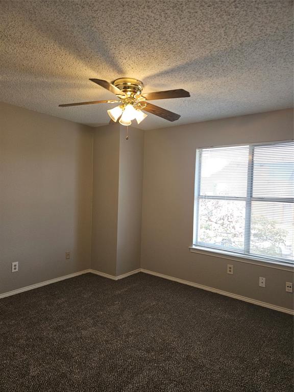 810 - Bedroom with one closet and ceiling fan.