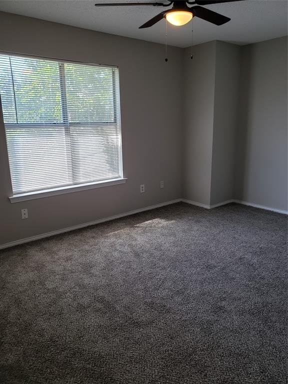 808 - Bedroom with two closets and ceiling fan.