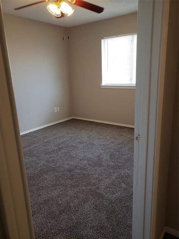 808 - Other bedroom with ceiling fan and one closet.
