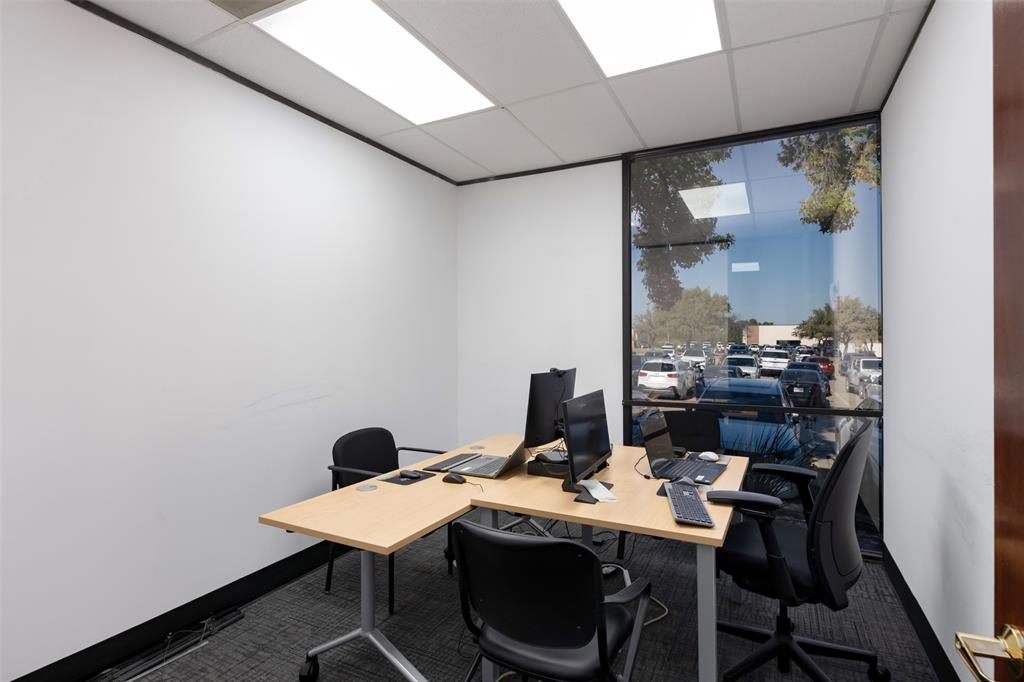 Office featuring a paneled ceiling