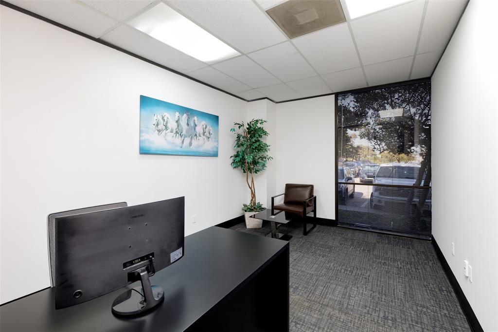 Office space featuring a drop ceiling