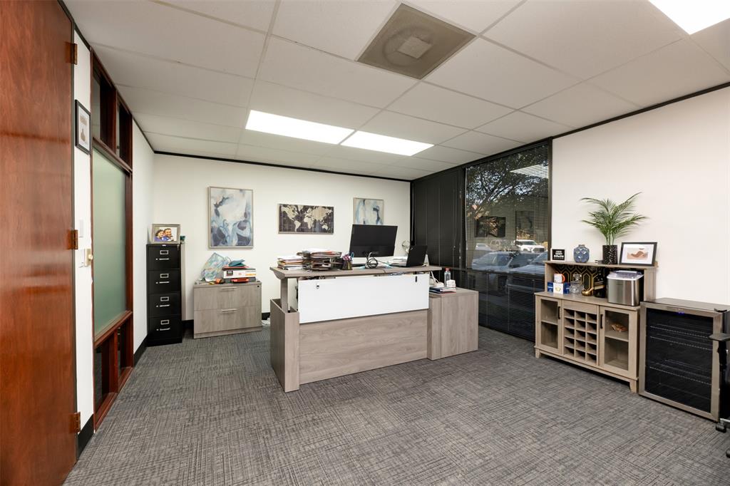 Office area featuring a paneled ceiling