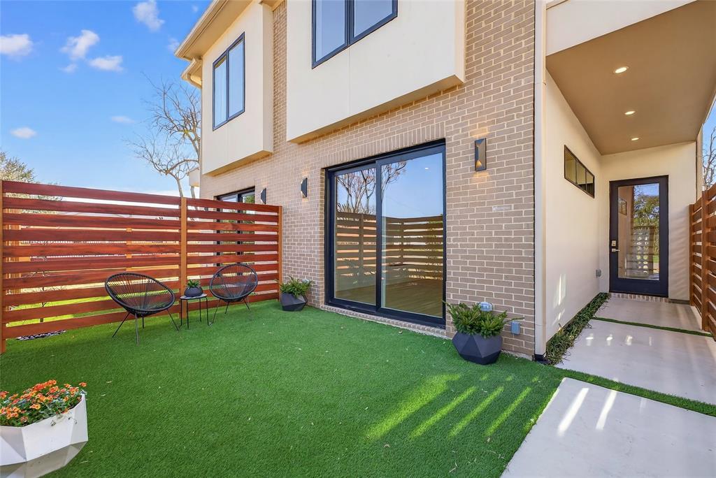 Private gated courtyard with tigerwood panels and artifical grass for a green space all year long. Private gated courtyard with tigerwood panels and artifical grass for a green space all year long.