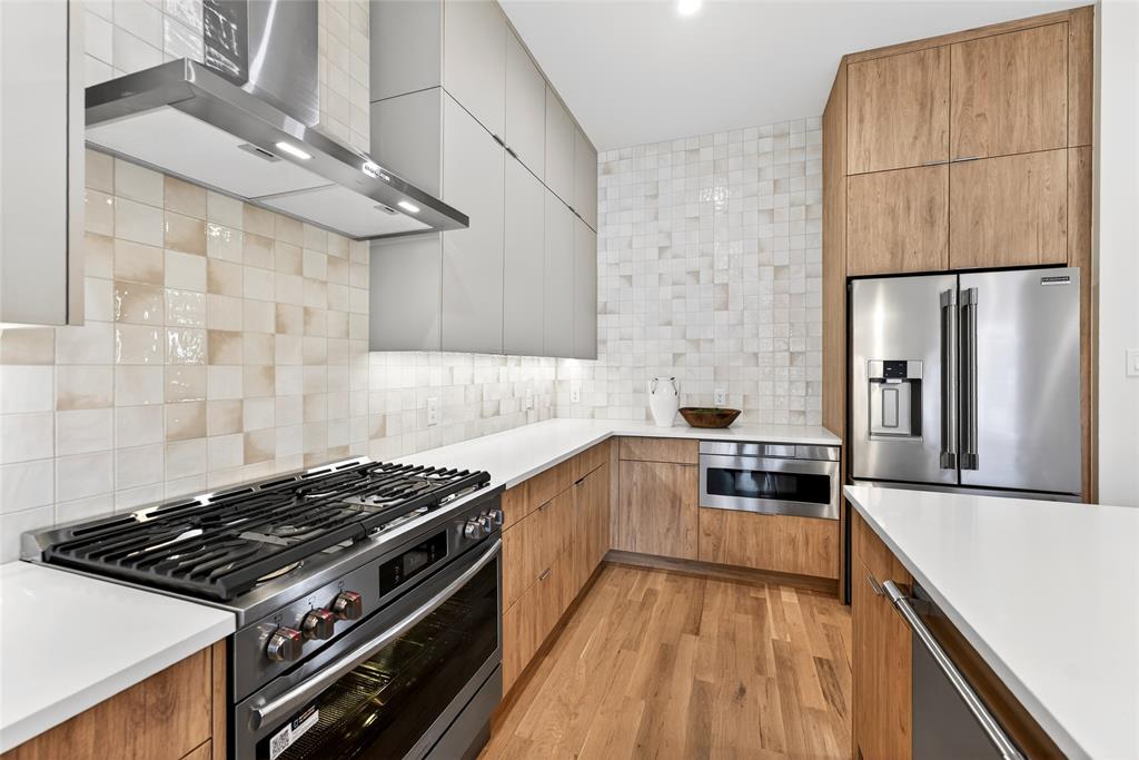 High end appliances feather a Frigidaire Professional gas stove, dishwasher and refirgerator. High end appliances feather a Frigidaire Professional gas stove, dishwasher and refirgerator.