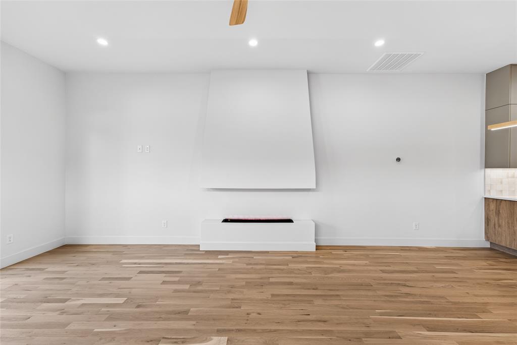 Water vapor fireplace offers ambiance and is non-toxic and eco-friendly.
