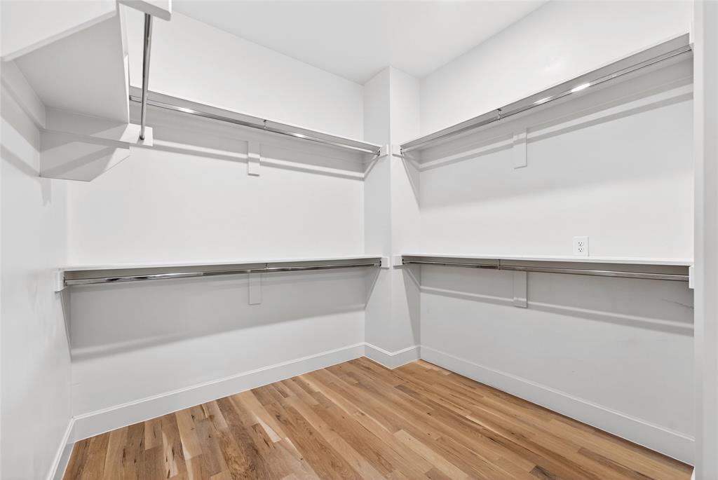 Large primary closet with ample storage.