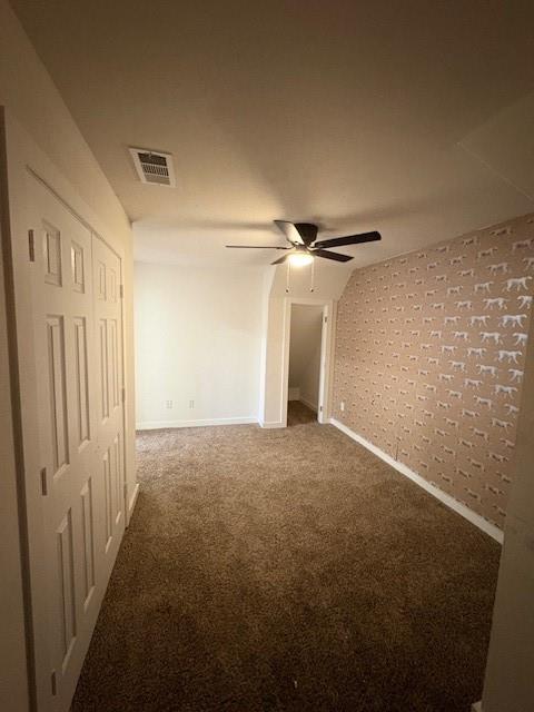 Bedroom one with multiple closets and ceiling fan is located on 2nd floor.