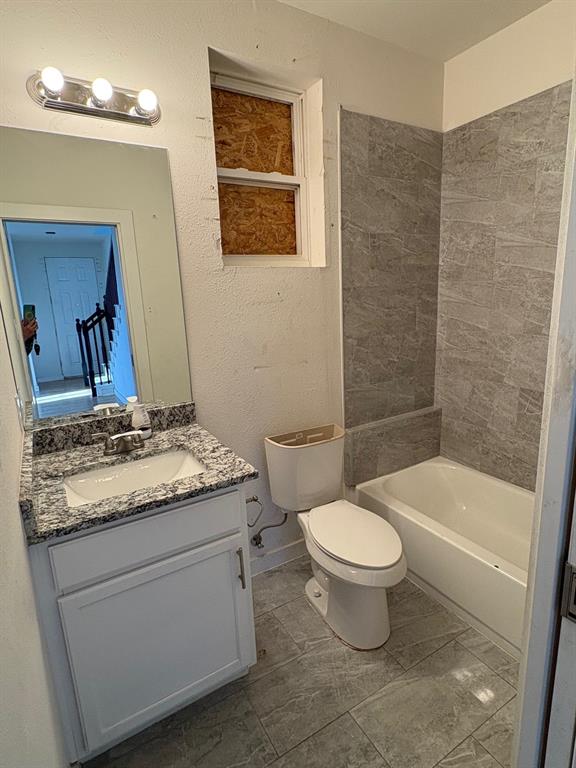 Bathroom located downstairs.