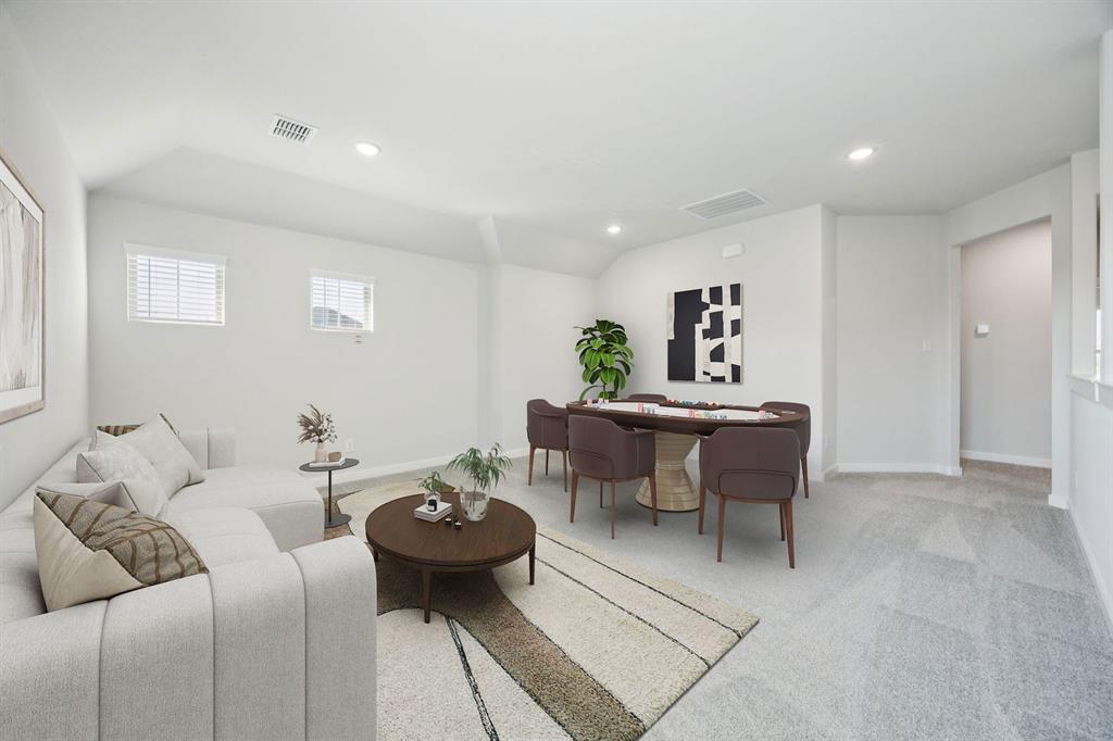 Game room in the Masters home plan by Trophy Signature Homes – REPRESENTATIVE PHOTO