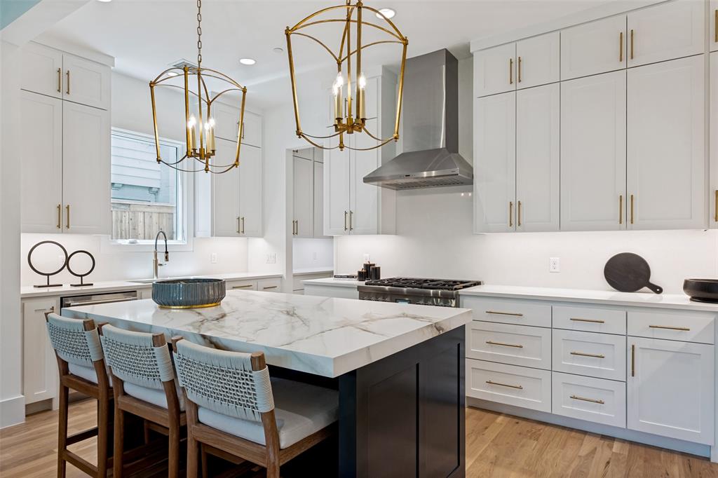 Island with casual bar seating adds to the kitchen's functionality as well as it's aesthetic appeal