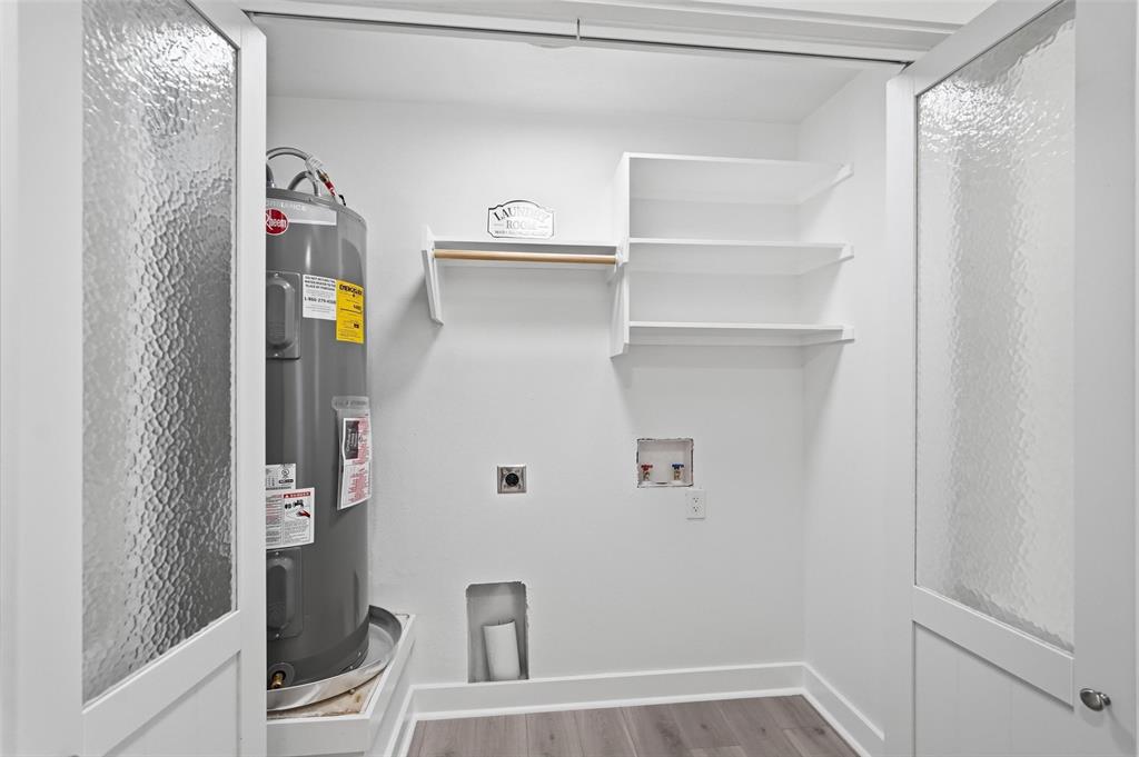 Large laundry room designed for convenience and everyday functionality.