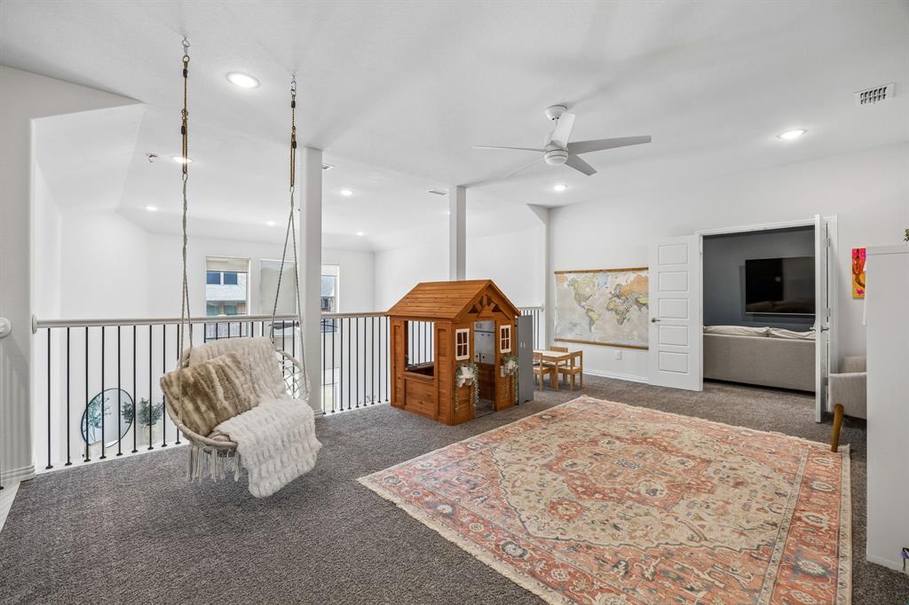 Sitting room featuring carpet floors, ceiling fan, and recessed lighting