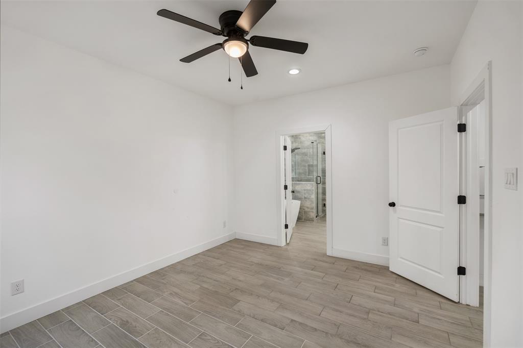 Primary bedroom with ensuite bath and separated from other bedrooms