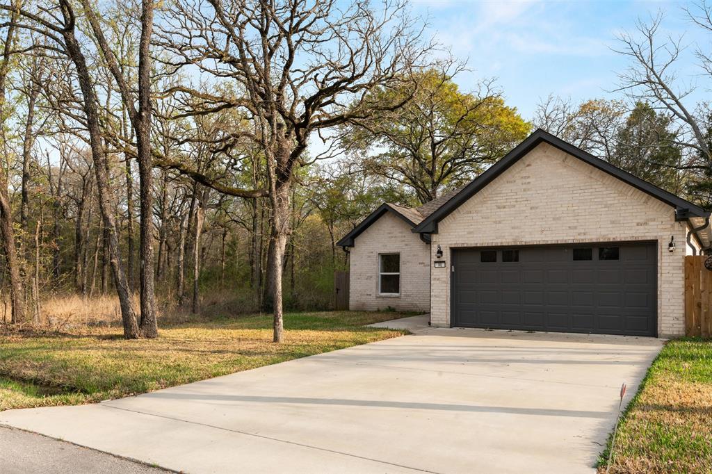 Front of structure with 2 car garage