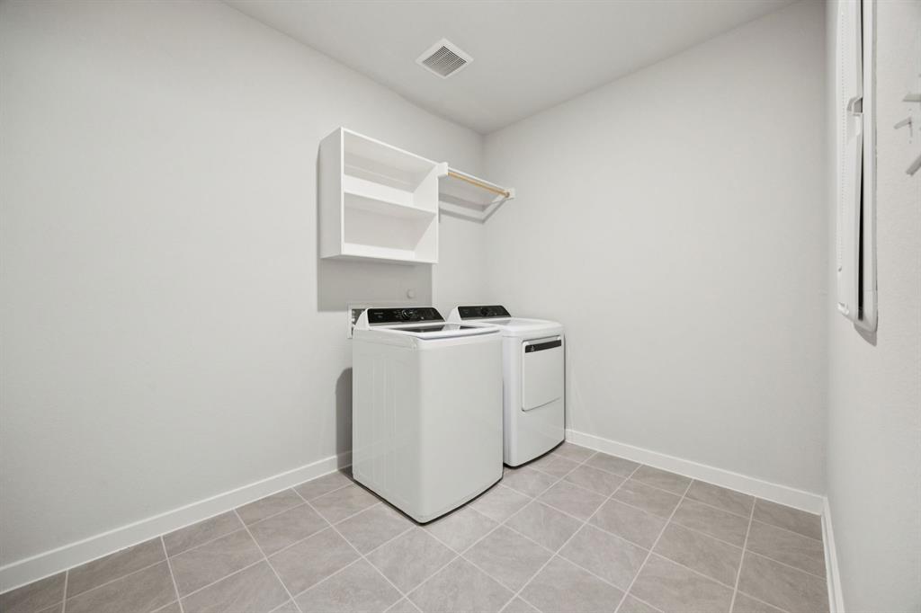 Utility Room in the Heisman home plan by Trophy Signature Homes – REPRESENTATIVE PHOTO