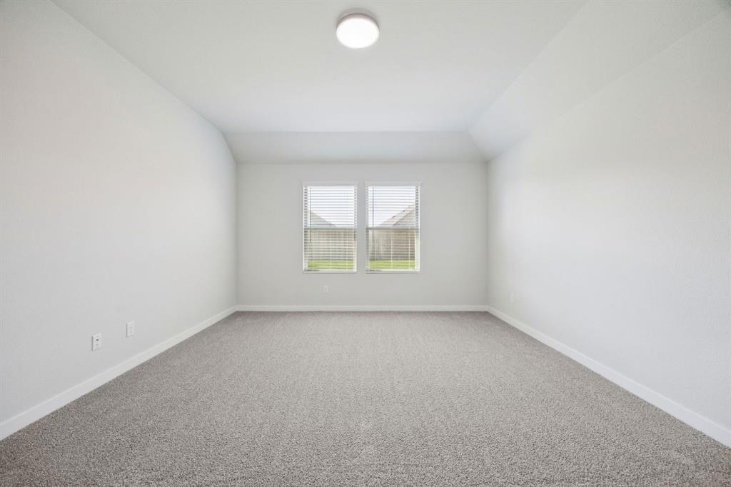 Primary Suite in the Heisman home plan by Trophy Signature Homes – REPRESENTATIVE PHOTO