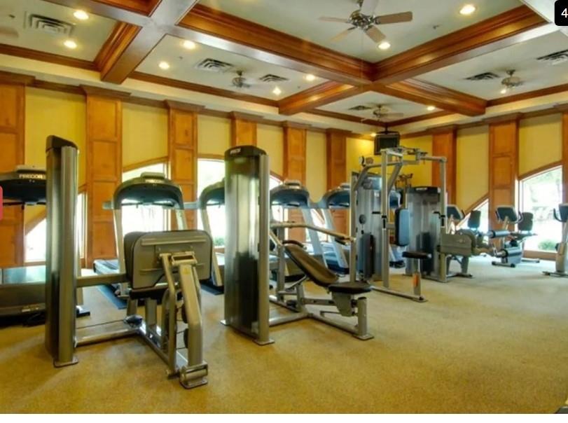 Fitness center featuring an array of cardio and strength training equipment