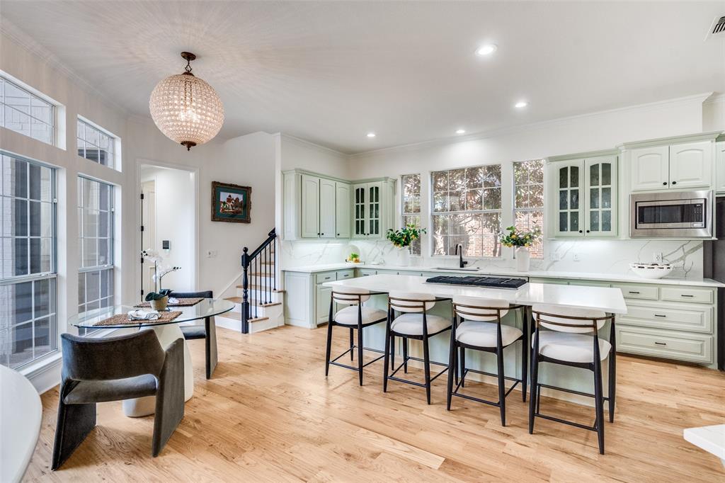 Cozy breakfast nook and additonal staircase for easy access to the upstairs bedrooms.