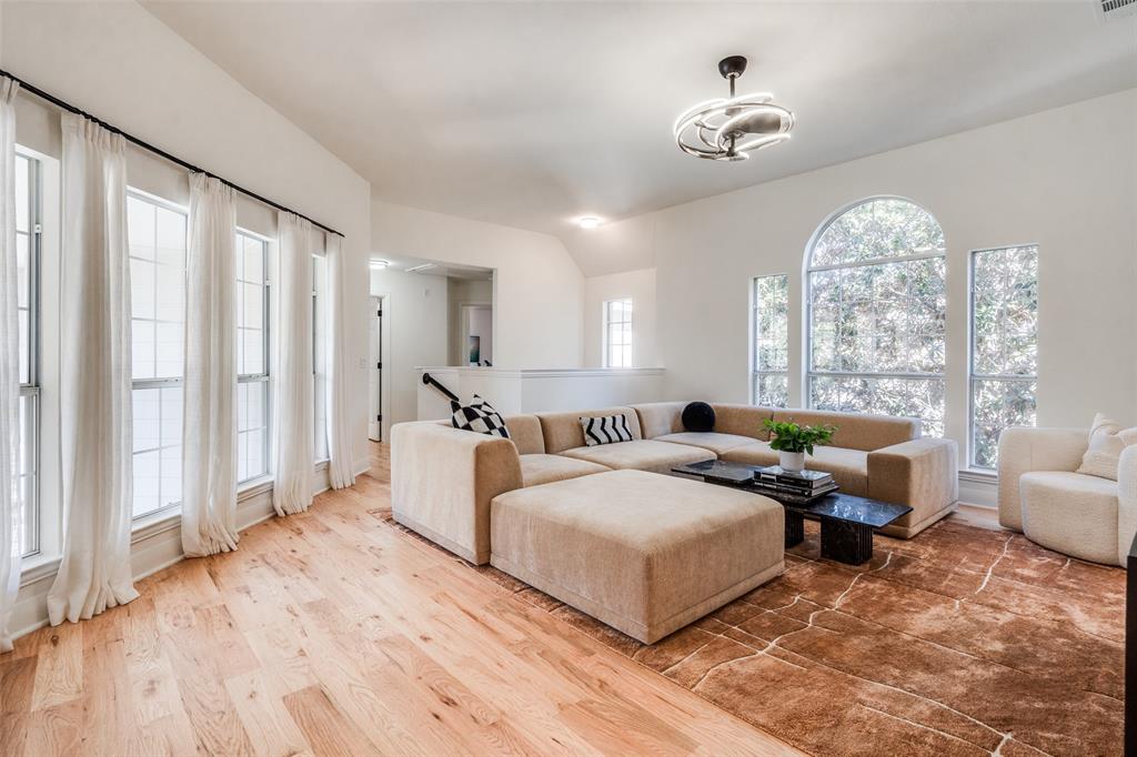 Large game room with tons of natural light.
