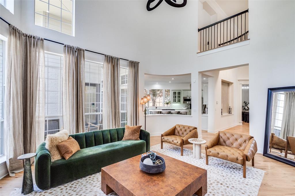 Beautifully redone family room with 2-story ceilings