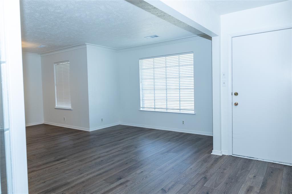 Formal living and dining space just off front entry.