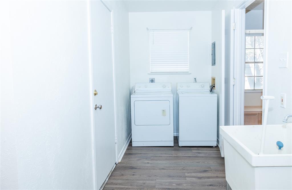 Spacious laundry area and pantry space.