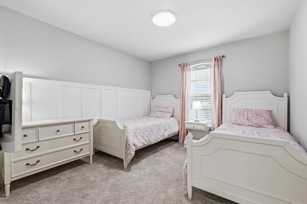 Neutral gray wall finishes complementing soft gray carpeting