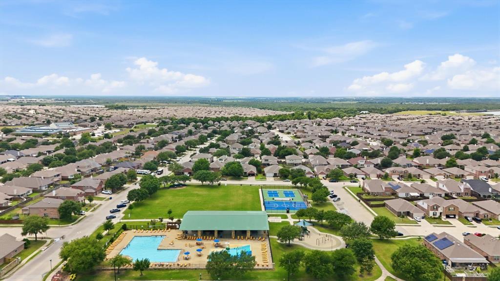 Community amenity center. Pool #1 with children's splash pad, playground, pavillion and pickleball courts.