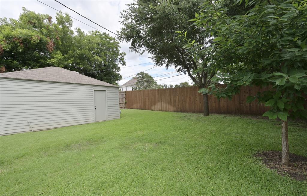 Large 8 ft privacy stained fenced backyard