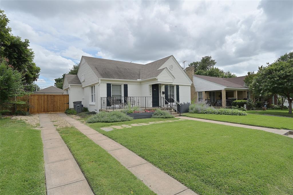 Driveway to the rear entry two car garage